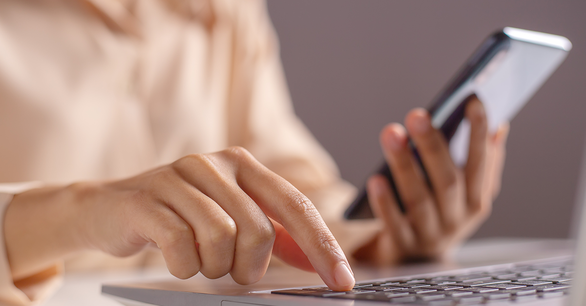 Woman types one time password