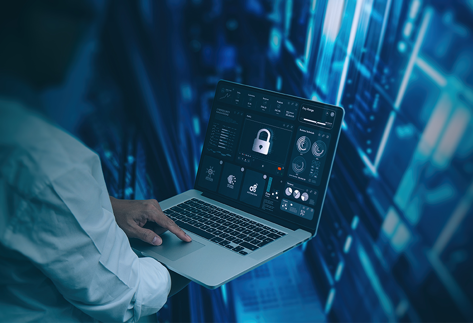 950x650 - Man using a laptop to access a system