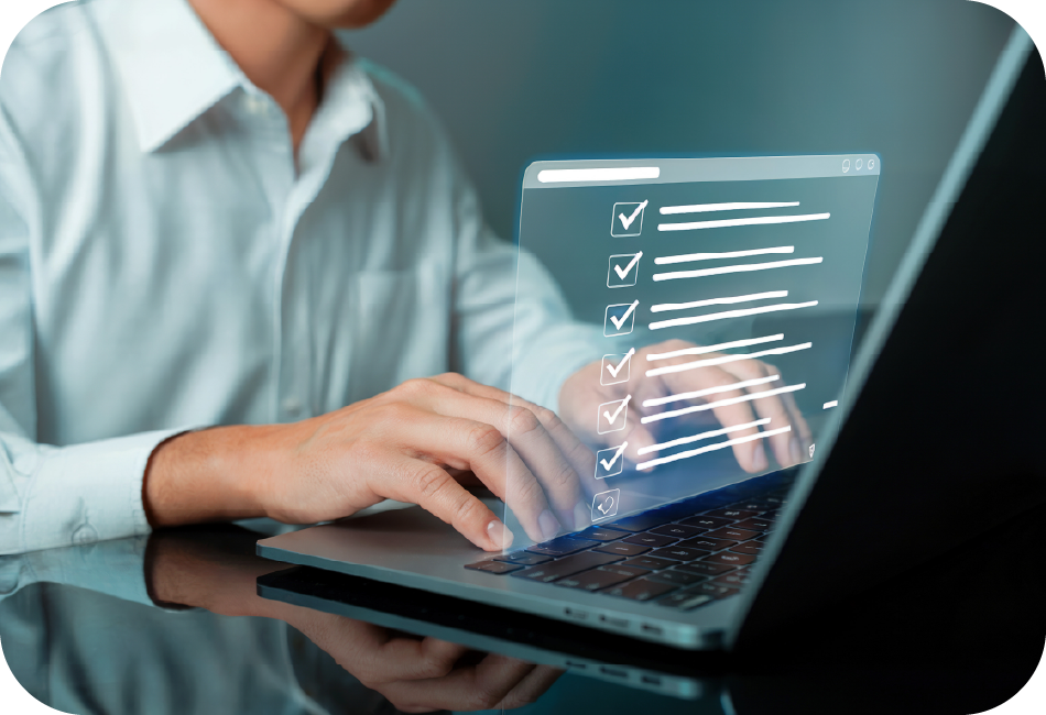 Man working on a laptop compliance