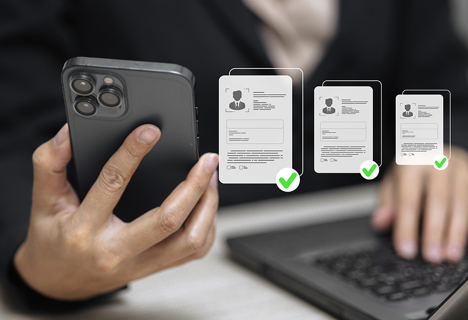 950x650 - Person holding iphone logging in to a app