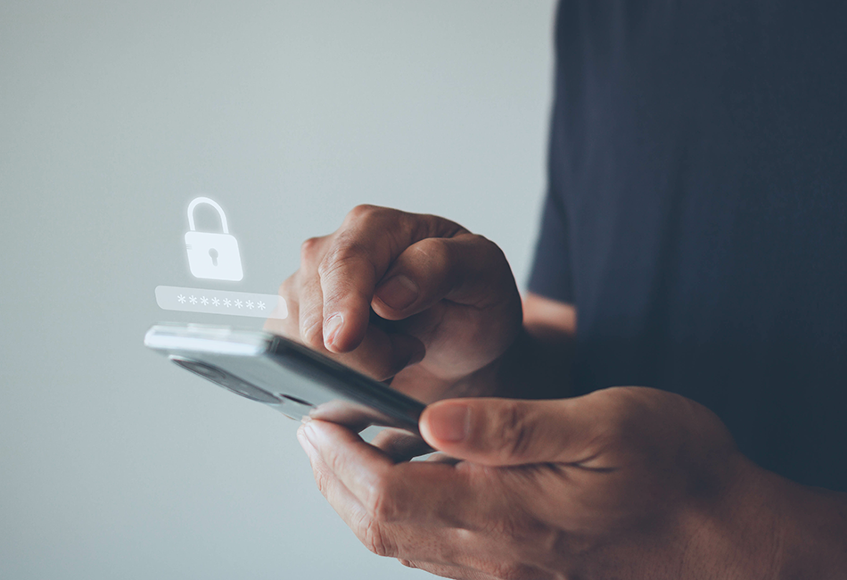 Person logging in phone 950x650