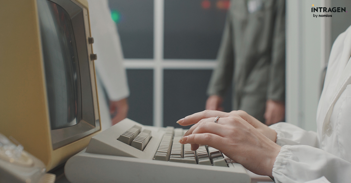 Woman using an old CRT Computer
